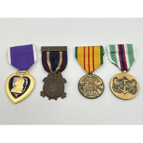 2097 - Four American medals, one Purple Heart, one Vietnam Service, one 1881 G.A.R Fili Veteranorum and one... 