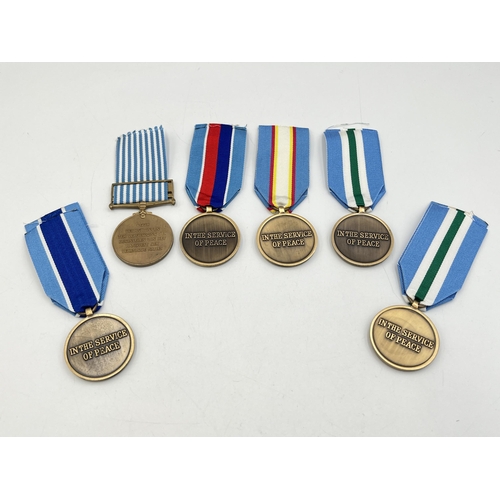 2098 - Six United Nations Service medals to include one with Korea clasp etc.