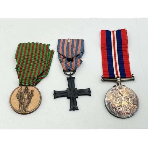 2100 - Three WWII medals, one Canadian Silver Issue War, one Italian Commemorative Medal of the War Period ... 