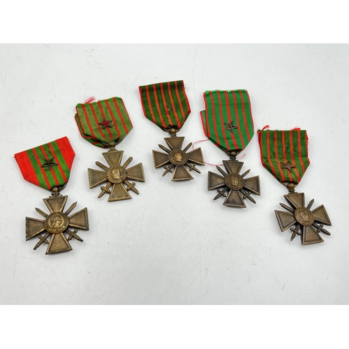 2120 - Five French Croix de Geurre medals, four WWI and one WWII