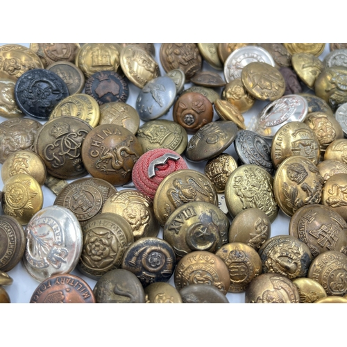 2126 - A collection of military buttons