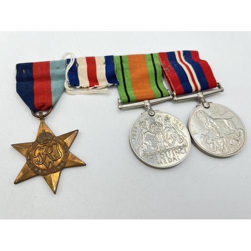 2138 - Three WWII British medals, one Defence, one War and one The 1939-1945 Star