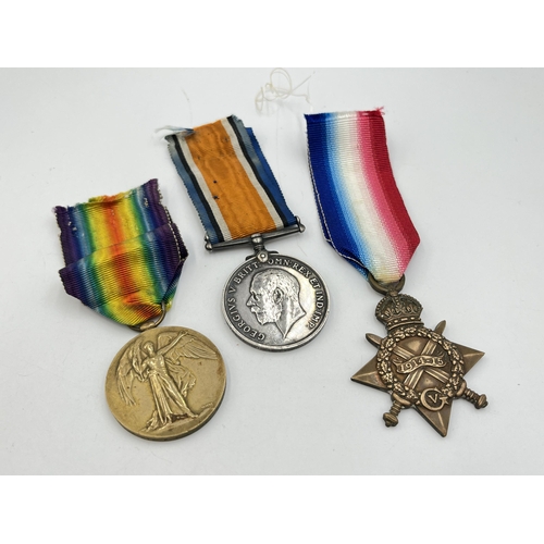 2140 - A WWI British medal trio presented to 275505 Pte. F. T. Sharp Manch. R.