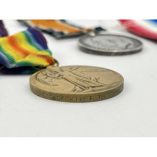 2140 - A WWI British medal trio presented to 275505 Pte. F. T. Sharp Manch. R.