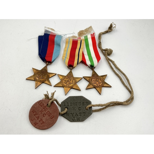 2144 - Five items, two WWI dog tags presented to 11262563 RC Wyatt JW and three WWII medals, The 1939-1945 ... 