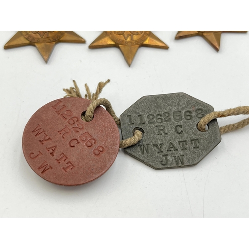 2144 - Five items, two WWI dog tags presented to 11262563 RC Wyatt JW and three WWII medals, The 1939-1945 ... 