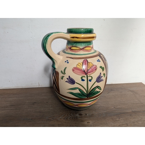 418A - A mid 20th century West German hand painted handled vase - shape number 486-38