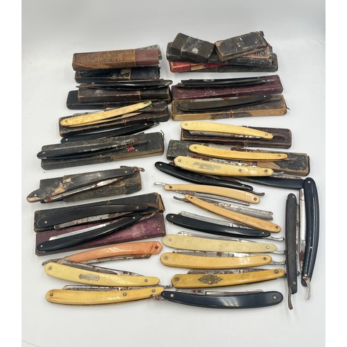 2067B - A collection of late 19th/early 20th century cut throat razors to include Ator, A. Schnittert Wald-S... 