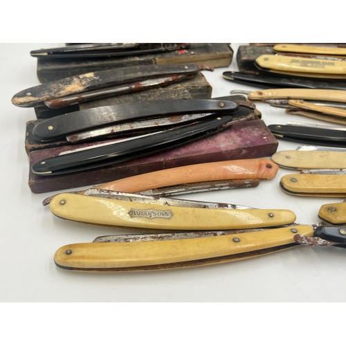 2067B - A collection of late 19th/early 20th century cut throat razors to include Ator, A. Schnittert Wald-S... 