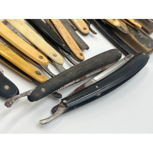 2067B - A collection of late 19th/early 20th century cut throat razors to include Ator, A. Schnittert Wald-S... 