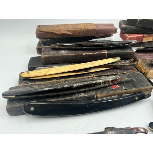 2067B - A collection of late 19th/early 20th century cut throat razors to include Ator, A. Schnittert Wald-S... 