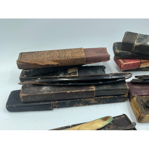 2067B - A collection of late 19th/early 20th century cut throat razors to include Ator, A. Schnittert Wald-S... 