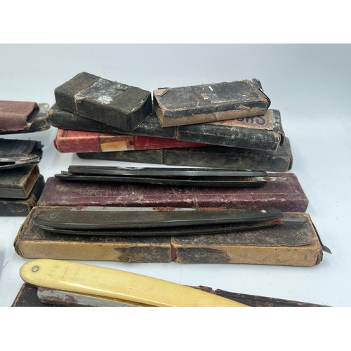 2067B - A collection of late 19th/early 20th century cut throat razors to include Ator, A. Schnittert Wald-S... 