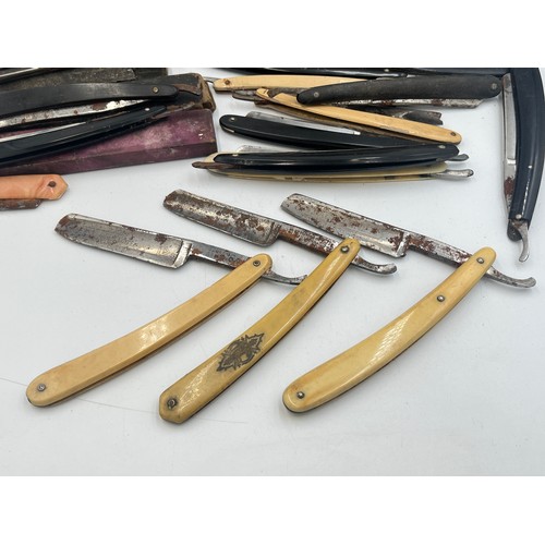 2067B - A collection of late 19th/early 20th century cut throat razors to include Ator, A. Schnittert Wald-S... 