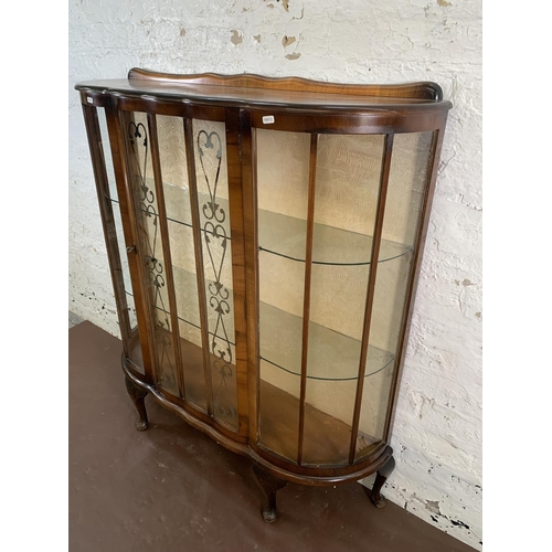 90 - A walnut display cabinet on cabriole supports - approx. 119cm high x 107cm wide x 30cm deep