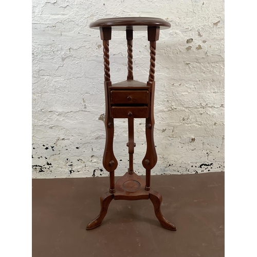 92 - A 19th century style mahogany circular top tripod jardinière stand - approx. 84cm high x 27cm diamet... 