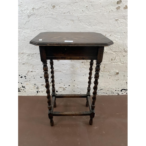 93 - An early 20th century oak barley twist side table - approx. 62cm high x 40cm wide x 30cm deep