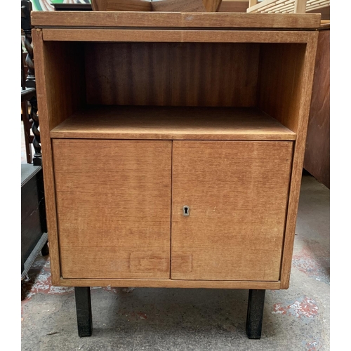 94 - A mid 20th century teak two door side cabinet - approx. 73cm high x 52 cm wide x 39cm deep