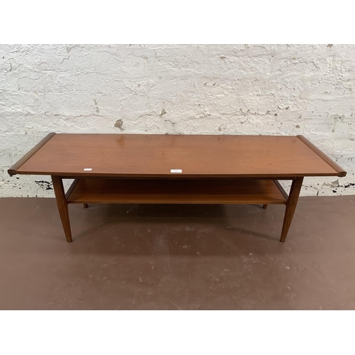 95 - A mid 20th century Myer teak two tier coffee table - approx. 36cm high x 38cm wide x 113cm long