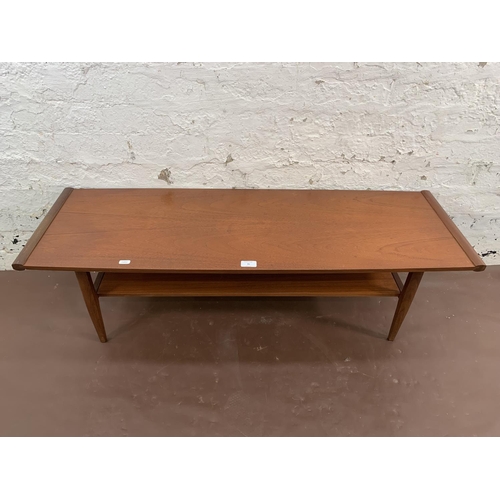 95 - A mid 20th century Myer teak two tier coffee table - approx. 36cm high x 38cm wide x 113cm long