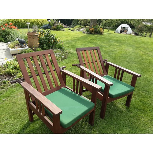 250A - A pair of teak reclining garden armchairs - approx. 93cm high x 65cm wide x 80cm deep