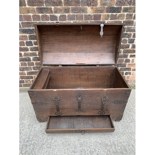 9 - A large 18th century German oak and metal banded dome top seaman's chest with lower drawer - approx.... 