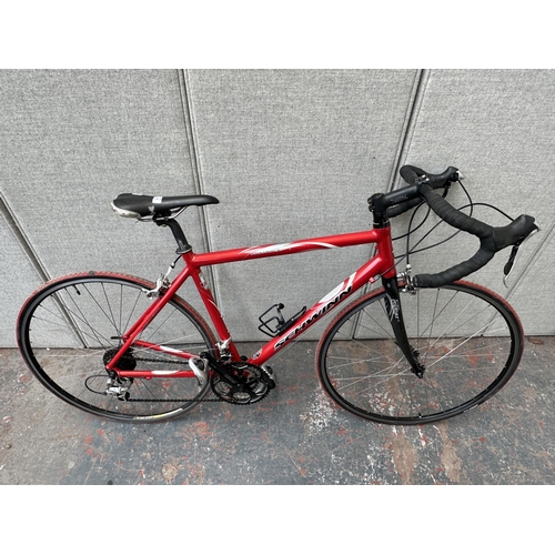 1016 - A Schwinn Select Series Fastback men's road bike with CF Reflex carbon forks