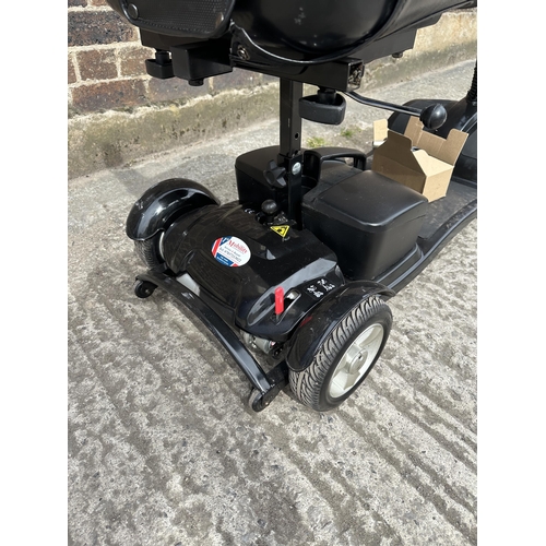 1033 - A KC compact mobility scooter