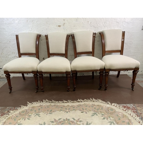 75 - Four 19th century oak and fabric upholstered dining chairs on castors