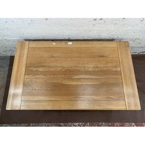 97 - A modern solid oak rectangular two tier coffee table - approx. 50cm high x 70cm wide x 120cm long