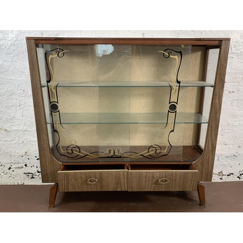 136 - A mid 20th century melamine and glass display cabinet - approx. 104cm high x 107cm wide x 30cm deep