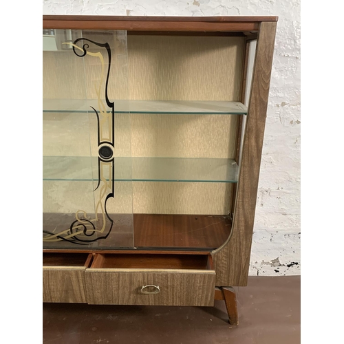 136 - A mid 20th century melamine and glass display cabinet - approx. 104cm high x 107cm wide x 30cm deep