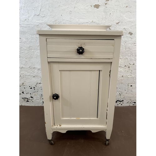 102 - A late 19th/early 20th century white painted satinwood bedside cabinet - approx. 84cm high x 55cm wi... 