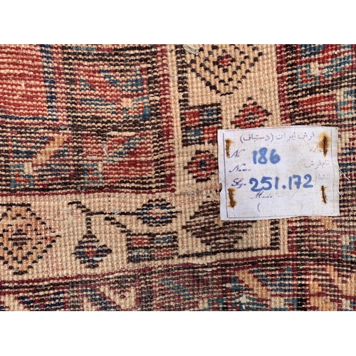 230 - A 20th century Kashqai rug - approx. 260cm x 168cm