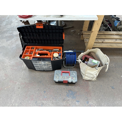 1073 - Two tool boxes and one bag containing extension cord, fixtures, fittings, screws, spanners, G clamps... 