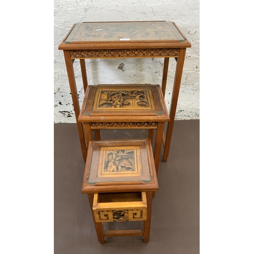 116 - Three Chinese carved hardwood side tables - largest approx. 66cm high x 50.5cm wide x 35cm deep