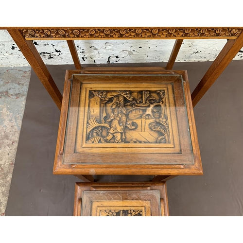 116 - Three Chinese carved hardwood side tables - largest approx. 66cm high x 50.5cm wide x 35cm deep