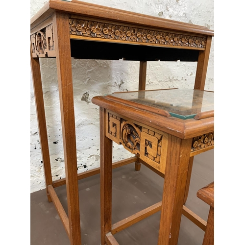 116 - Three Chinese carved hardwood side tables - largest approx. 66cm high x 50.5cm wide x 35cm deep