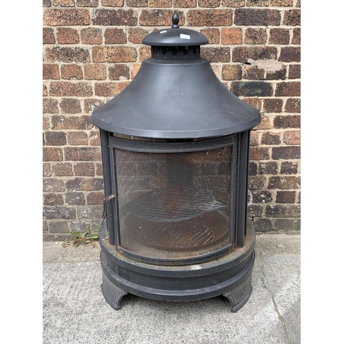 117 - A large black metal garden firepit - approx. 133cm high