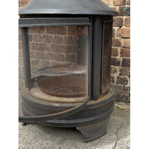 117 - A large black metal garden firepit - approx. 133cm high