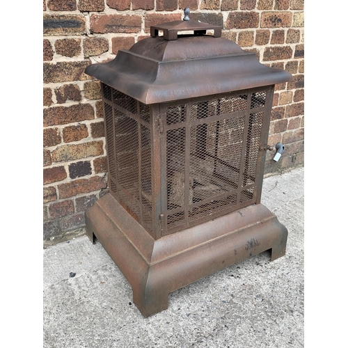 118 - An Oriental style metal garden firepit - approx. 104cm high x 71cm wide x 71cm deep