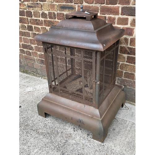 118 - An Oriental style metal garden firepit - approx. 104cm high x 71cm wide x 71cm deep