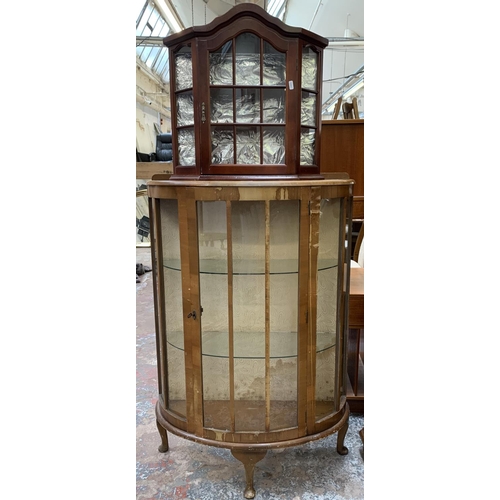 129 - Two pieces of furniture, one mid 20th century bow fronted display cabinet and one mahogany wall hang... 