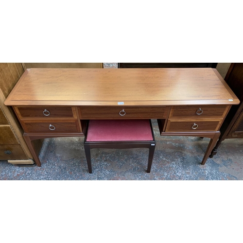 140 - Four items, one Stag Minstrel mahogany dressing table, one Stag Minstrel mahogany upholstered dressi... 