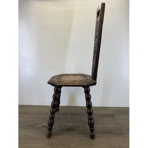 141 - A vintage carved oak spinning chair - approx. 87cm high