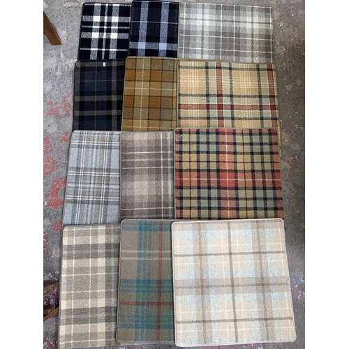 18 - A large quantity of Hugh Mackay carpet samples from The Tartan Collection - each approx. 65cm x 65cm