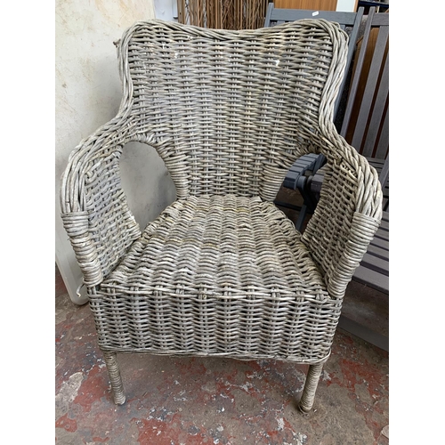 20 - Five pieces of furniture, three wooden grey painted folding garden chairs, one wicker armchair and o... 