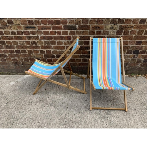 35 - A pair of mid 20th century style beech framed sun loungers