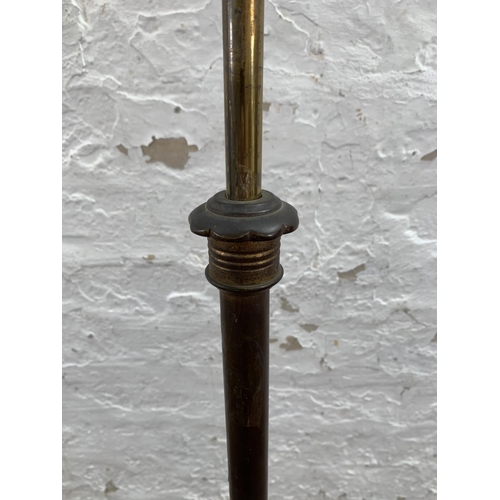 38 - An Arts & Crafts copper telescopic standard lamp on footed base - approx. 147cm high