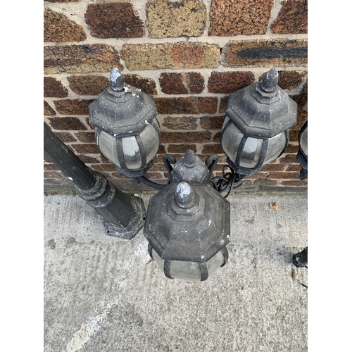 42 - A pair of Victorian style cast metal three branch garden/street lanterns - approx. 215cm high